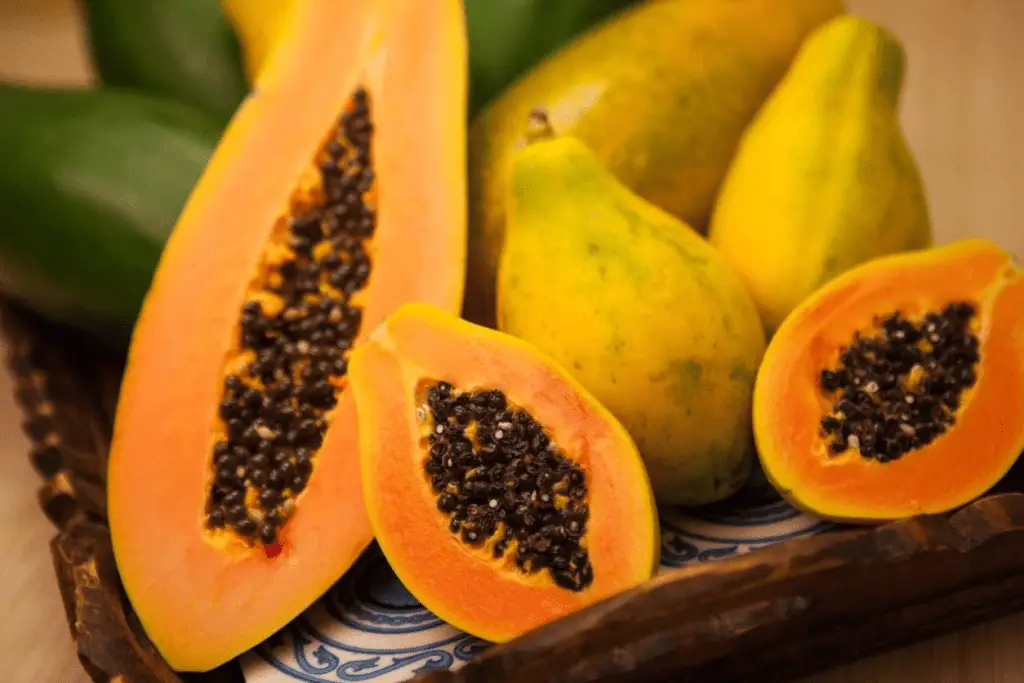 Fresh-cut papaya and its seeds are shown in this file photo. Learn about budgie diet at Petrestart.com.